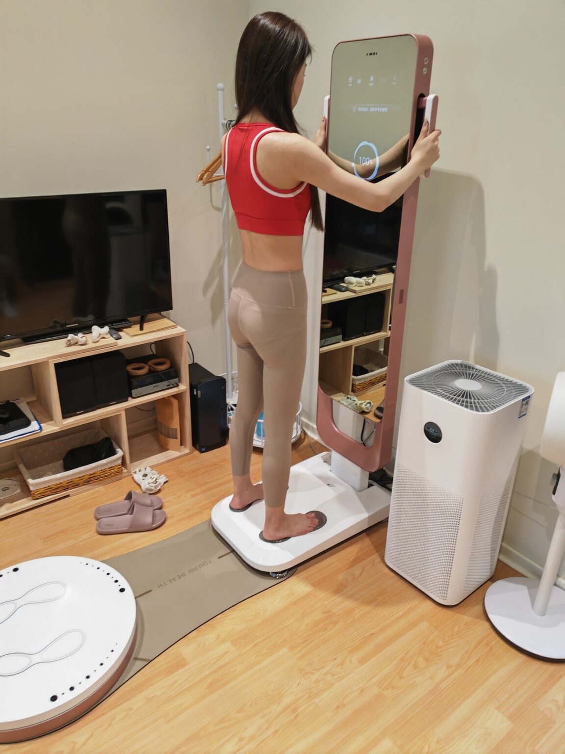 User checking health metrics on Body-Elite body composition analyse